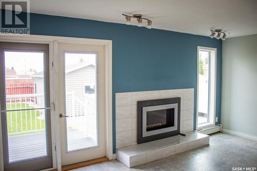 402 Main Street, St. Brieux, SK - Indoor Photo Showing Living Room With Fireplace