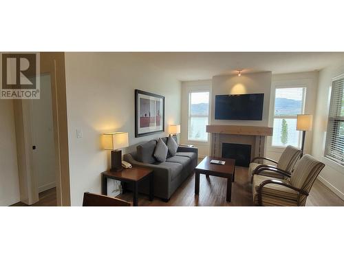 4200 Lakeshore Drive Unit# 120, Osoyoos, BC - Indoor Photo Showing Living Room With Fireplace