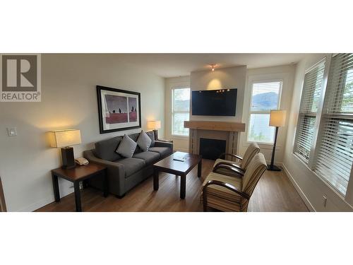 4200 Lakeshore Drive Unit# 120, Osoyoos, BC - Indoor Photo Showing Living Room With Fireplace