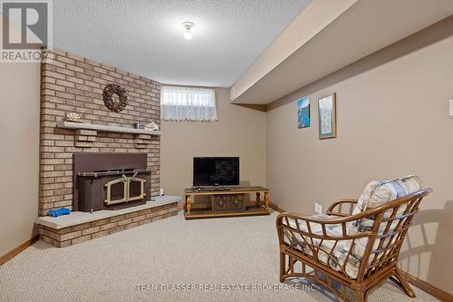 2 Greenfield Court, London, ON - Indoor With Fireplace