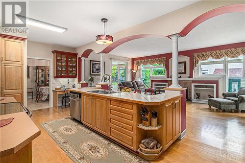 163 Yoho Drive, Kanata, ON - Indoor Photo Showing Kitchen With Fireplace With Double Sink