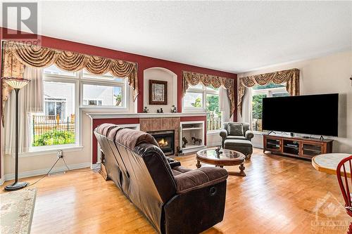 163 Yoho Drive, Kanata, ON - Indoor Photo Showing Living Room With Fireplace