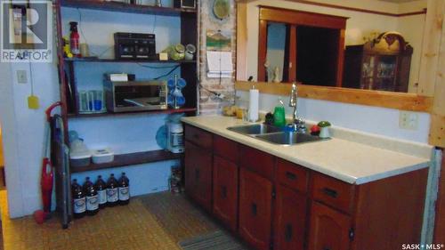 412 1St Avenue W, Buchanan, SK - Indoor Photo Showing Kitchen With Double Sink