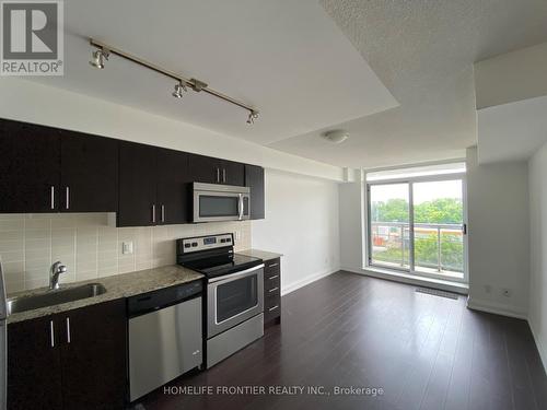 308 - 3520 Danforth Avenue, Toronto (Oakridge), ON - Indoor Photo Showing Kitchen With Stainless Steel Kitchen