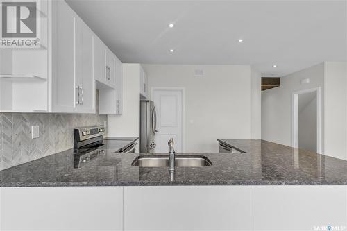 307A 108Th Street W, Saskatoon, SK - Indoor Photo Showing Kitchen With Double Sink With Upgraded Kitchen