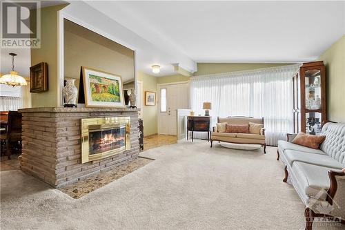 2309 Samuel Drive, Ottawa, ON - Indoor Photo Showing Living Room With Fireplace