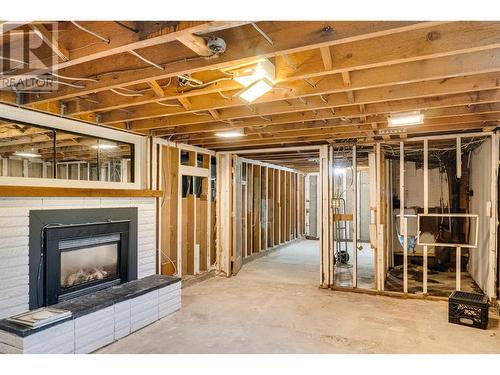 46 Morgan Street, Kitimat, BC - Indoor Photo Showing Basement With Fireplace