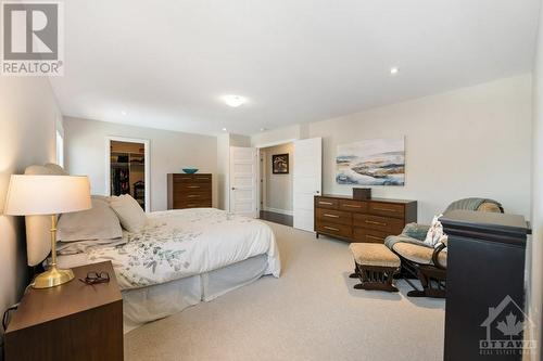 Primary Bedroom towards Walk In Closet - 633 Misty Street, Russell, ON - Indoor Photo Showing Bedroom