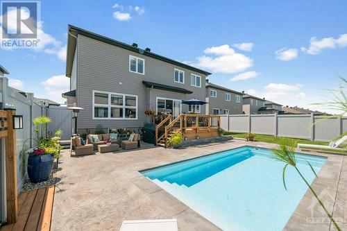 Pool Deck and Patio - 633 Misty Street, Russell, ON - Outdoor With In Ground Pool With Deck Patio Veranda With Backyard