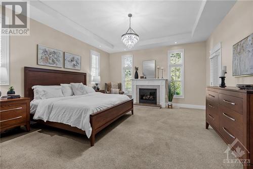 Primary Bedroom - 5426 Wadell Court, Manotick, ON - Indoor Photo Showing Bedroom