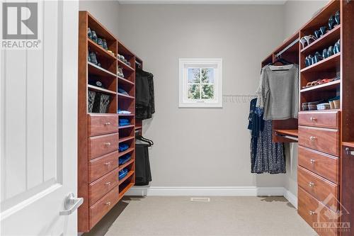 Primary Walk-in Closet - 5426 Wadell Court, Manotick, ON - Indoor With Storage