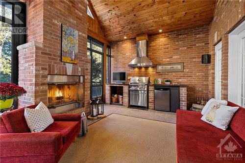 5426 Wadell Court, Manotick, ON - Indoor With Fireplace