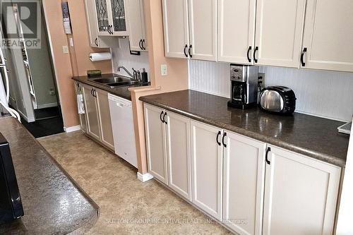 103 - 54 Fittons Road W, Orillia, ON - Indoor Photo Showing Kitchen With Double Sink