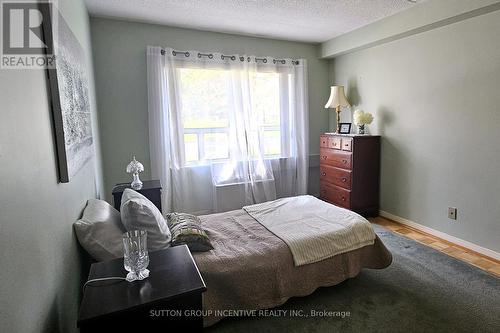 103 - 54 Fittons Road W, Orillia, ON - Indoor Photo Showing Bedroom