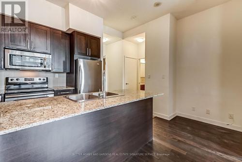 707 - 4065 Brickstone Mews, Mississauga, ON - Indoor Photo Showing Kitchen With Double Sink