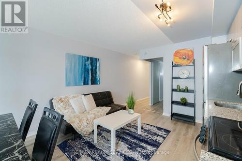 215 - 36 Lisgar Street, Toronto, ON - Indoor Photo Showing Living Room With Fireplace