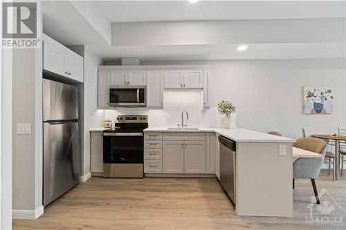 31 Eric Devlin Lane Unit#117, Perth, ON - Indoor Photo Showing Kitchen With Upgraded Kitchen