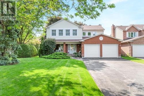 Exceptional curb appeal with mature landscaping. - 21 Keys Way, Ottawa, ON - Outdoor With Facade