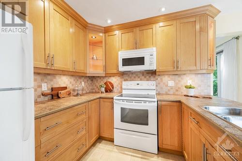 Under-cabinet lighting offers a soft glow. - 21 Keys Way, Ottawa, ON - Indoor Photo Showing Kitchen With Double Sink