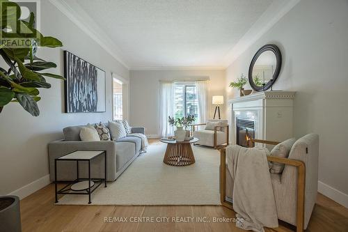 43 Ravine Ridge Way, London, ON - Indoor Photo Showing Living Room With Fireplace