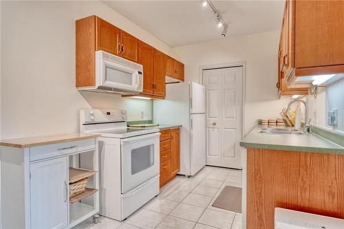 2075 Amherst Heights Drive|Unit #405, Burlington, ON - Indoor Photo Showing Kitchen With Double Sink