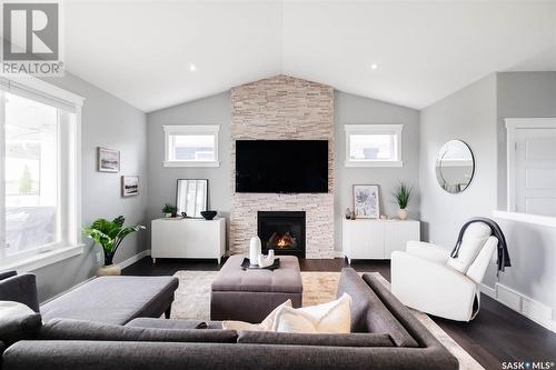 305 Butte Street, Pilot Butte, SK - Indoor Photo Showing Living Room With Fireplace