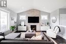 305 Butte Street, Pilot Butte, SK  - Indoor Photo Showing Living Room With Fireplace 