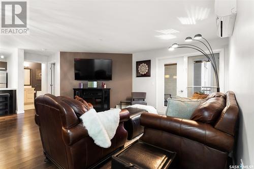222 1545 Neville Drive, Regina, SK - Indoor Photo Showing Living Room