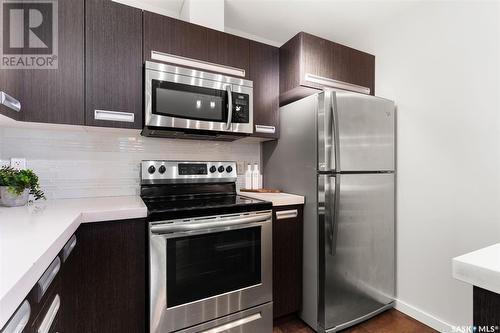 222 1545 Neville Drive, Regina, SK - Indoor Photo Showing Kitchen With Stainless Steel Kitchen