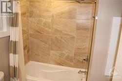 MAIN BATH WITH SHOWER AND TUB - 