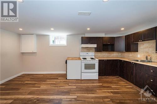 Basement Full Kitchen with Dishwasher and Large Eating Area - 564 Highcroft Avenue, Ottawa, ON - Indoor Photo Showing Kitchen