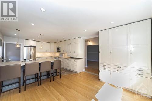 Kitchen Eating Area with Hardwood Floors - 564 Highcroft Avenue, Ottawa, ON - Indoor Photo Showing Kitchen With Upgraded Kitchen