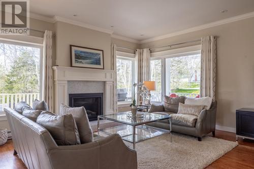 106 Lower Road, Outer Cove, NL - Indoor Photo Showing Living Room With Fireplace