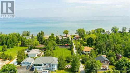 This luxurious property boasts 106.50 feet of waterfront and spans an expansive 1.05 acres of lush, landscaped grounds. - 11, 13, 19 C Lane, Collingwood, ON - Outdoor With Body Of Water With View