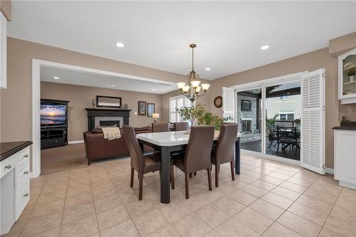103 Dicenzo Drive, Hamilton, ON - Indoor Photo Showing Dining Room With Fireplace
