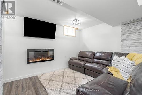 1301 Hunter Street, Innisfil, ON - Indoor Photo Showing Living Room With Fireplace