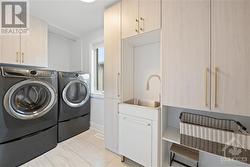 Upstairs laundry room - 