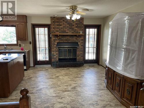 2 Shaw Place, Assiniboia, SK - Indoor Photo Showing Other Room With Fireplace