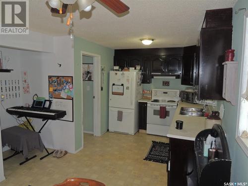 801 King Street, Estevan, SK - Indoor Photo Showing Kitchen With Double Sink