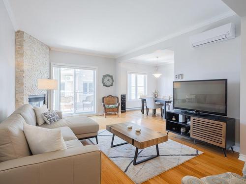 Salon - 1C-275 Rue Deslières, Saint-Bruno-De-Montarville, QC - Indoor Photo Showing Living Room With Fireplace