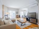 Salon - 1C-275 Rue Deslières, Saint-Bruno-De-Montarville, QC  - Indoor Photo Showing Living Room With Fireplace 