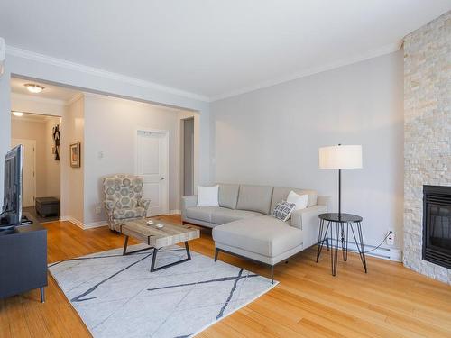 Salon - 1C-275 Rue Deslières, Saint-Bruno-De-Montarville, QC - Indoor Photo Showing Living Room With Fireplace