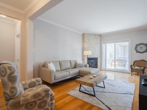 Salon - 1C-275 Rue Deslières, Saint-Bruno-De-Montarville, QC - Indoor Photo Showing Living Room With Fireplace