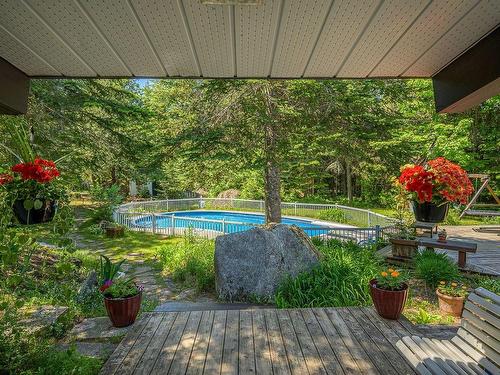 Cour - 12 Place D'Artois, Estérel, QC - Outdoor With In Ground Pool With Deck Patio Veranda With Backyard