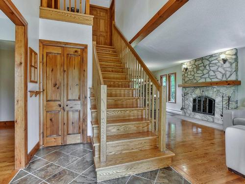 Staircase - 1074 Rue Mathieu, Saint-Jérôme, QC - Indoor Photo Showing Other Room With Fireplace