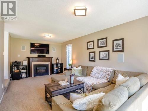 3314 Grassfire Crescent, Mississauga, ON - Indoor Photo Showing Living Room With Fireplace