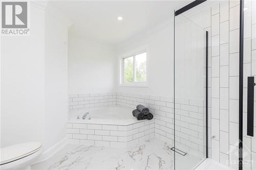 Luxurious soaker tub and large glass shower - 87 Ida Street S, Arnprior, ON - Indoor Photo Showing Bathroom