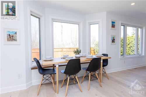 Eating area with custom window bench, flooding with natural light. - 87 Ida Street S, Arnprior, ON - Indoor Photo Showing Dining Room