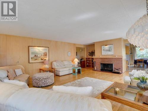 6956 Victoria Street, Powell River, BC - Indoor Photo Showing Living Room With Fireplace