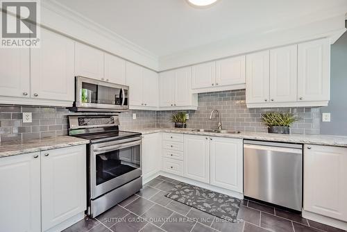 5919 Blue Spruce Avenue, Burlington, ON - Indoor Photo Showing Kitchen With Stainless Steel Kitchen With Double Sink